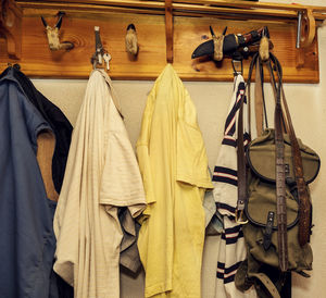 Close-up of clothes hanging on wall