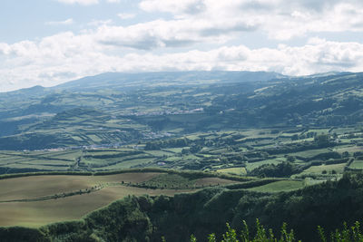 Aerial view of landscape and mountains against sky