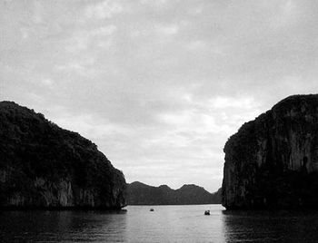 Scenic view of sea against cloudy sky