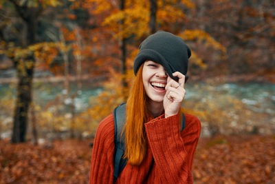 Young woman wearing hat during autumn