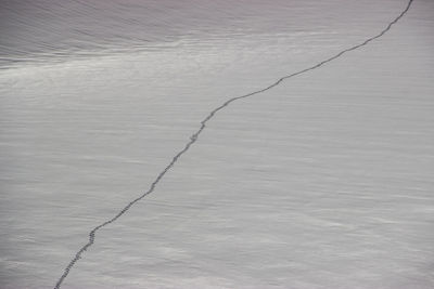 Full frame shot of snow on sand