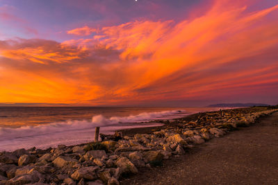 Scenic view of sea against sky during sunset