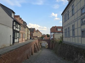 Buildings in city against sky