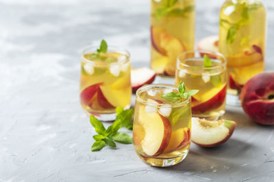 Fruits in glass on table