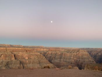 Scenic view of rock formations against sky