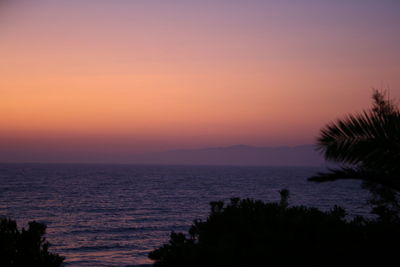Scenic view of sea at sunset