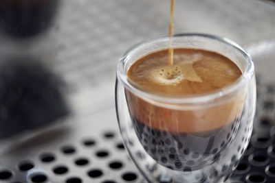 High angle view of coffee cup on table