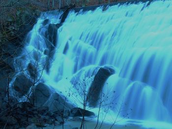 View of water flowing through rocks