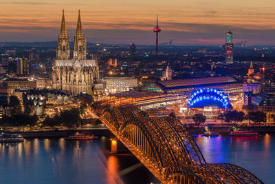 Aerial view of illuminated city at night