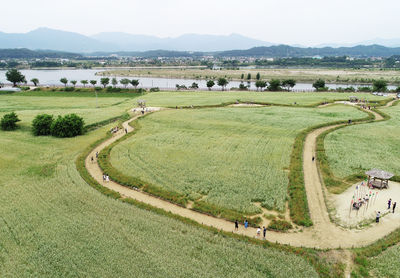 High angle view of agricultural landscape against sky