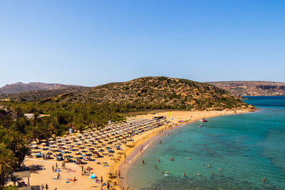 High angle view of beach against clear blue sky