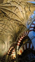 Low angle view of ornate ceiling in building