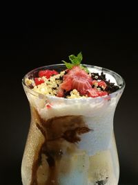 Close-up of ice cream against black background