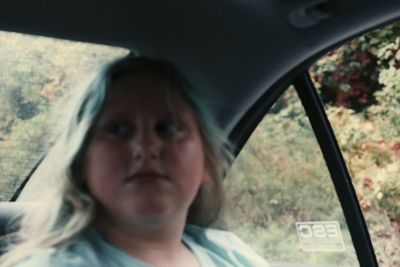 Portrait of man in car