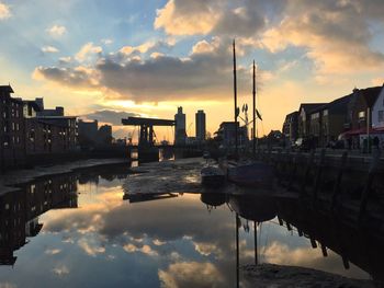 Scenic view of sunset over city