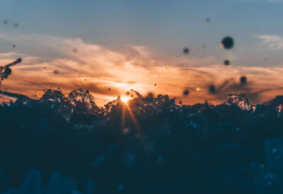 Scenic view of silhouette landscape against sky during sunset
