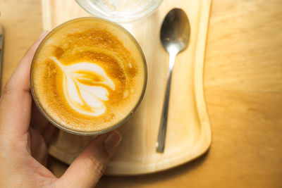 Close-up of coffee cup on table