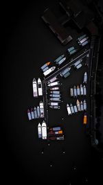 Drone shot of boats moored at harbor