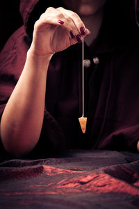 Close-up of woman holding hand