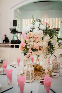 Flower vase on table at home