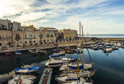 Boats moored in harbor