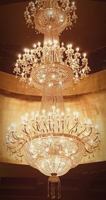 Low angle view of illuminated chandelier