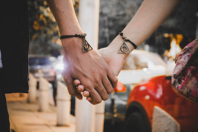 Close-up of man hand on street