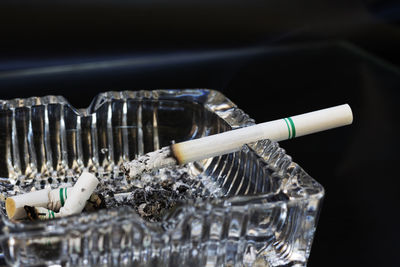 Close up of cigarette on ashtray
