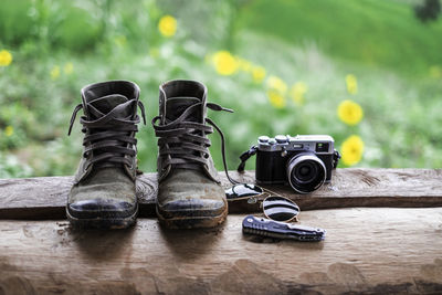 Close-up of shoes with camera