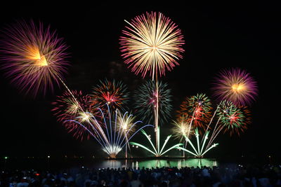 Firework display at night