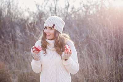 Portrait of young woman in winter