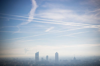 Aerial view of modern buildings in city against sky, lyon