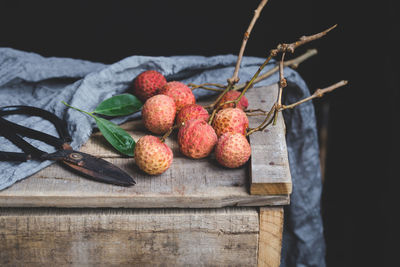 Close-up of fruits on wood
