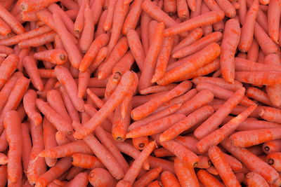 Full frame shot of carrots for sale at market stall