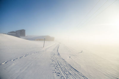 Snow covered mountain against sky