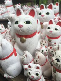 Close-up of maneki neko figurines for sale