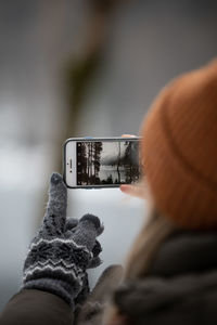 Close-up of hand holding smart phone