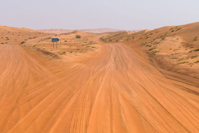 Scenic view of desert against sky