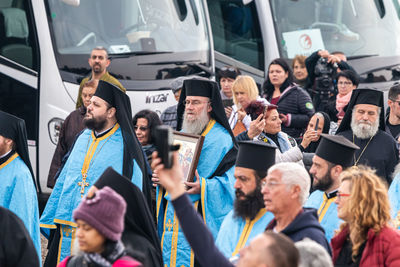 Group of people standing on bus