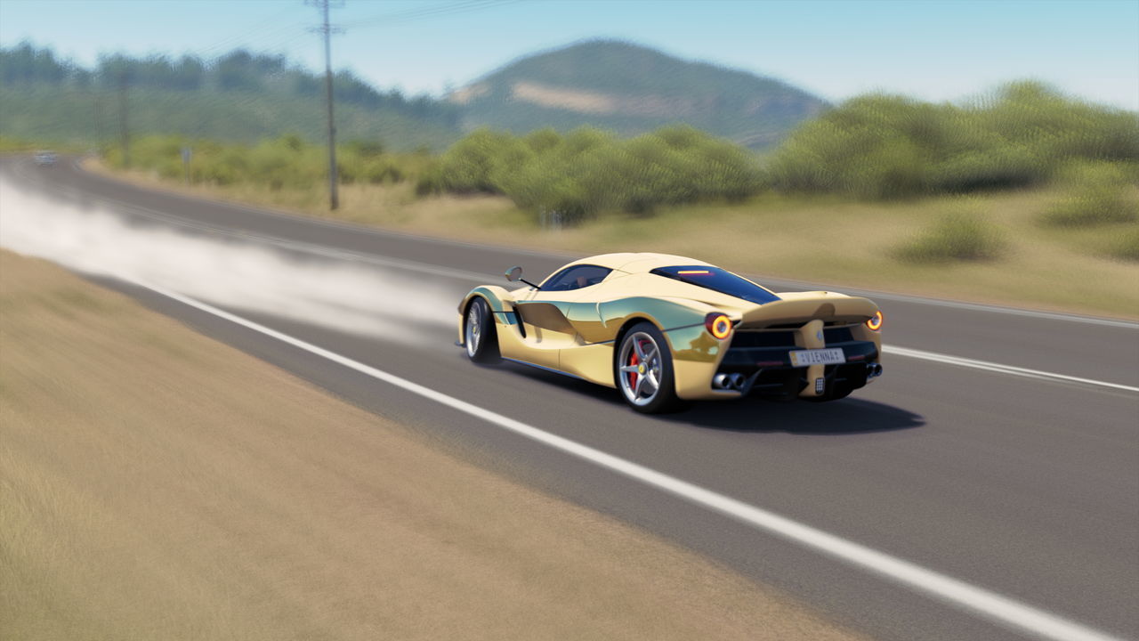 VINTAGE CAR MOVING ON ROAD AGAINST MOUNTAIN