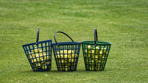 Tennis balls in baskets