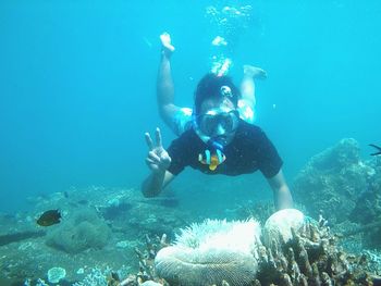 Man swimming in sea