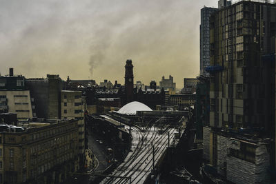 Cityscape against sky during winter