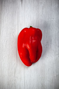 Close-up of red bell peppers on table