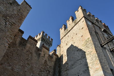 Low angle view of fort against sky