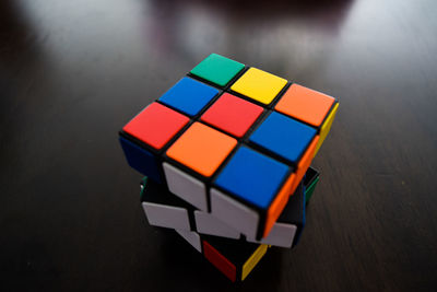 Close-up of colorful puzzle cube on table