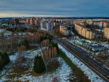 High angle view of buildings in city during winter