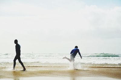 People running on beach