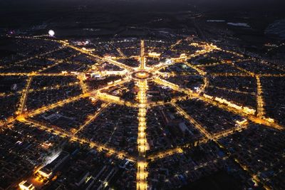 High angle view of illuminated cityscape at night