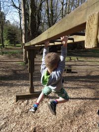 Boy playing on playground